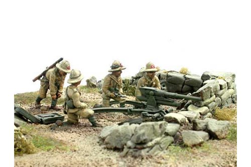 Artillerymen in colonial uniform with antitank gun 47/32.